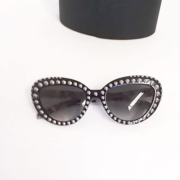 Prada woman sunglasses SPR 31QS cat eye