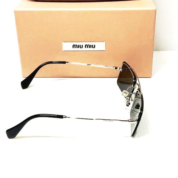 Miu Miu woman’s sunglasses smu 59T silver frame grey lenses