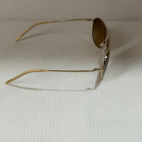 Oliver peoples woman’s sunglasses of 1002s Benedict photochronic glass lenses