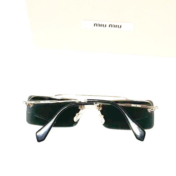 Miu Miu woman’s sunglasses smu 59T silver frame grey lenses