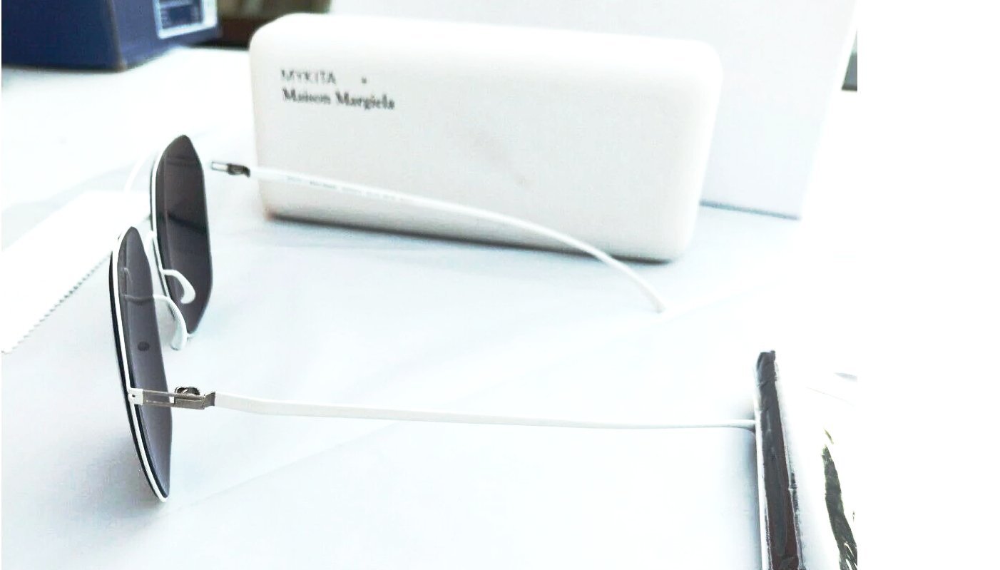 Mykita + Maison Margiela sunglasses white frame grey lenses